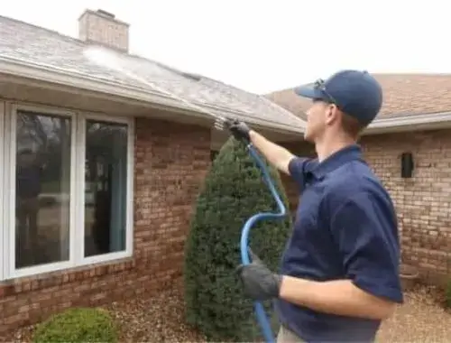Katy, TX Roof Soft Washing Action Shot